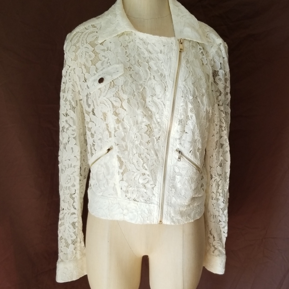 Bebe sheer lace jacket. Zipper pockets